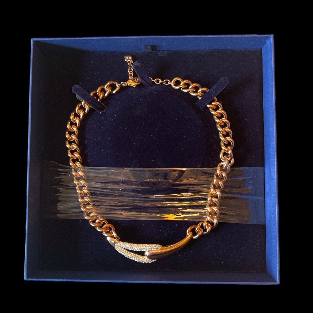 Swarovski necklace. Purchased from Off Saks. NWT. Rose gold in color